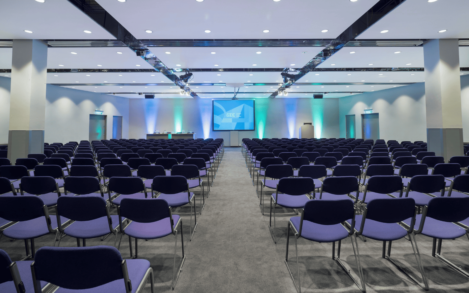 image of the Forth room with theatre style seating looking towards projector
