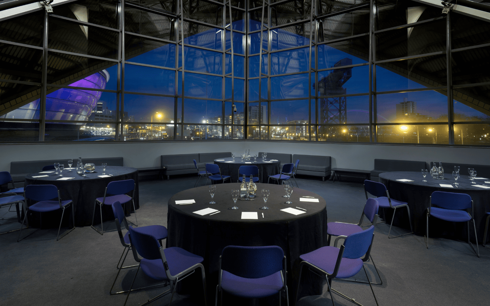 Image of the Gala room during night time with windows overlooking the hydro