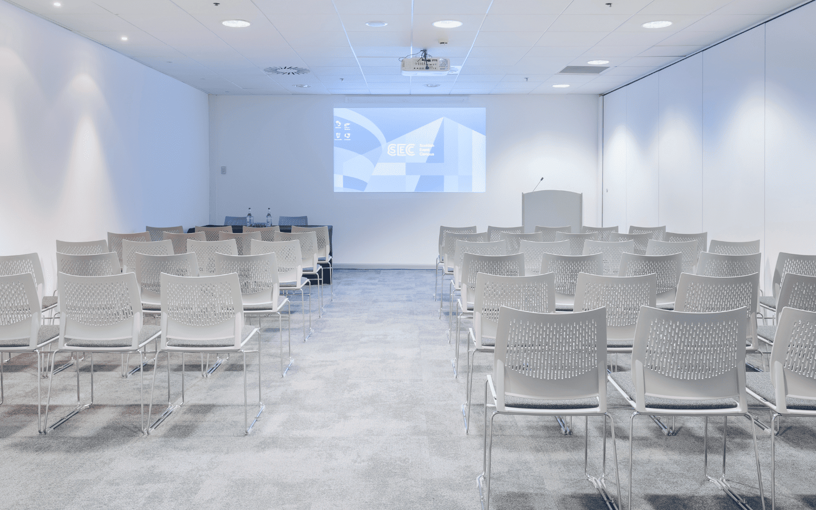 image of M3 room with theatre style seating and projector