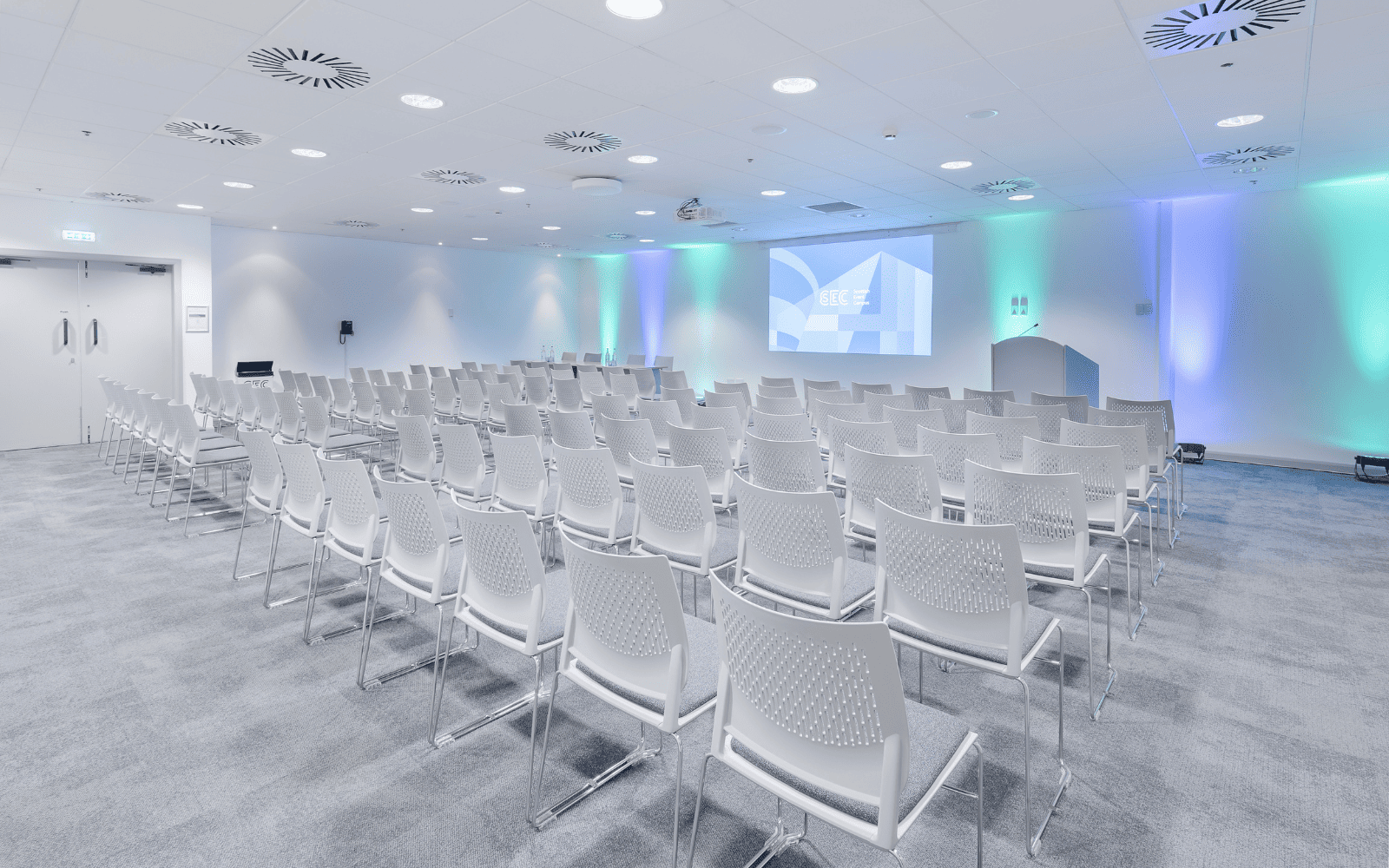 M4 room with theatre seating and projector