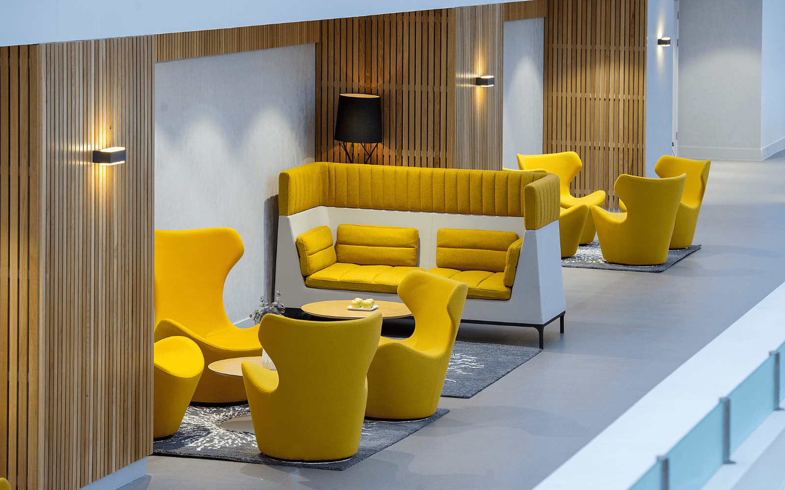 image of SEC Meeting Academy with yellow couches