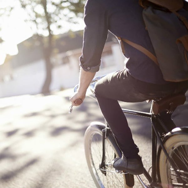 Man cycling on a sunny day.