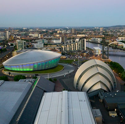 Drone image of the SEC from above with the river and city centre in the background.