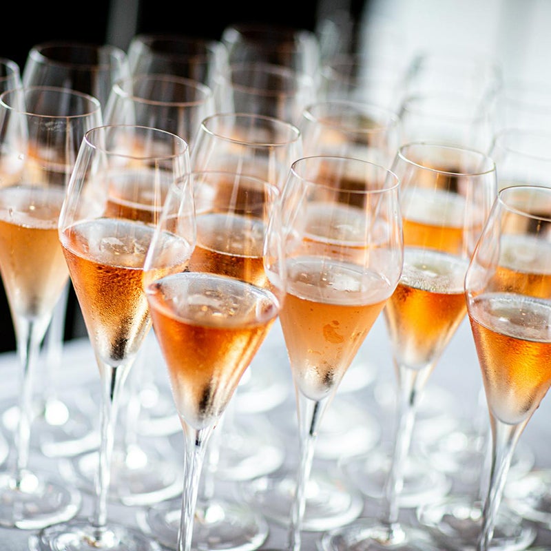 Glasses of pink champagne.