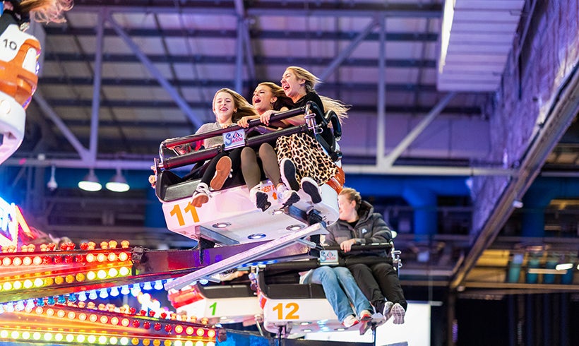 People on a ride at Irn-Bru Carnival.